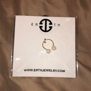 Pearl and gold band ring